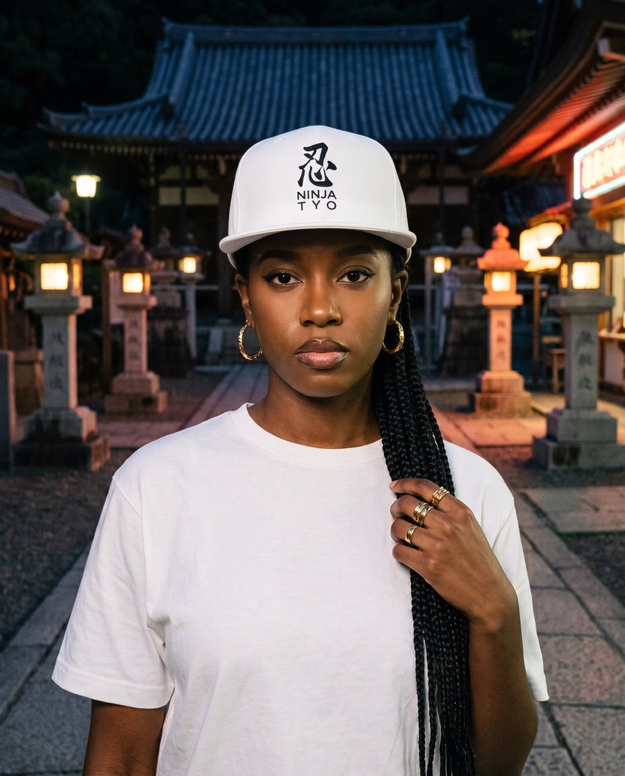 Shinobi Kanji Embroidered Snapback in White and Grey worn at a Tokyo temple at night | NINJA TYO